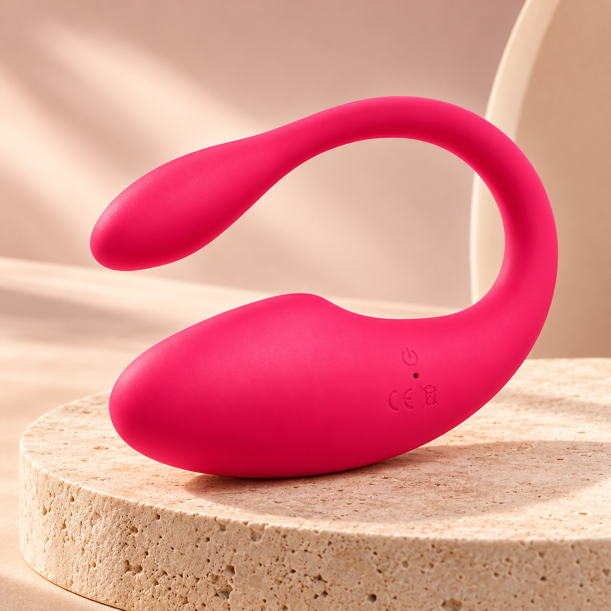 VibeSync luxury handheld massager resting gracefully on woven linen with warm lighting
